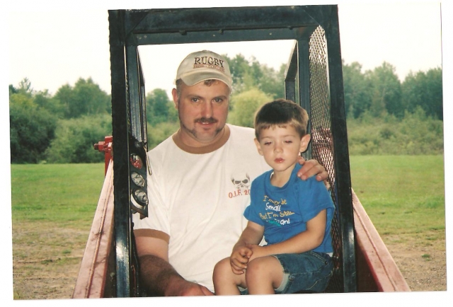 Merton DeWitt and his son Vincent in Minnesota after a tour in Iraq
