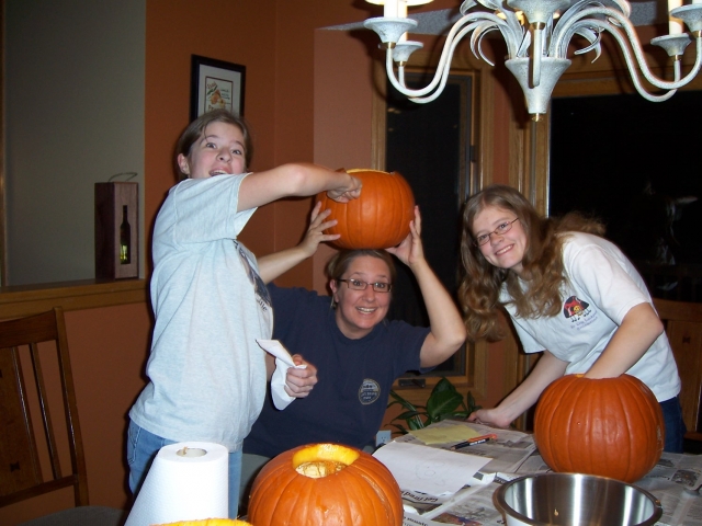 Jody (Holmes) Cassell carving pumpkins with the family....xo